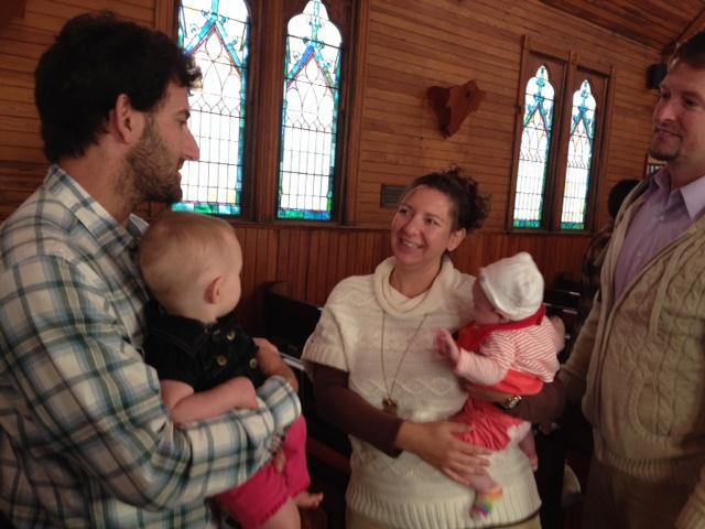 photo of young children with family