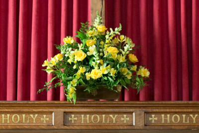 photo of yellow altar flowers